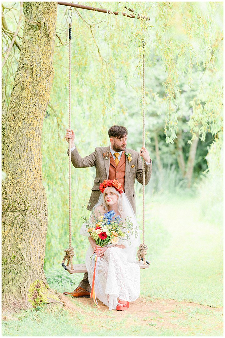 Cute wedding couple on a swing in North Yorkshire