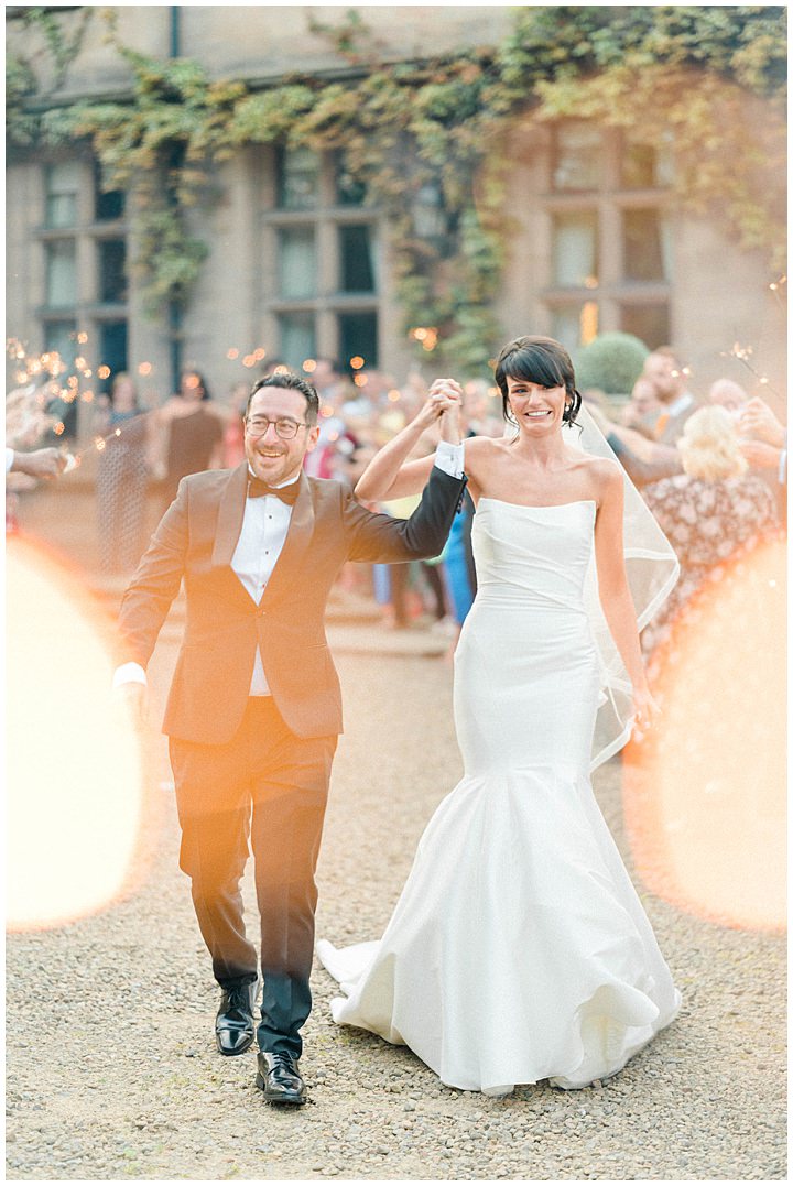 creative wedding photography of wedding couple with sparklers